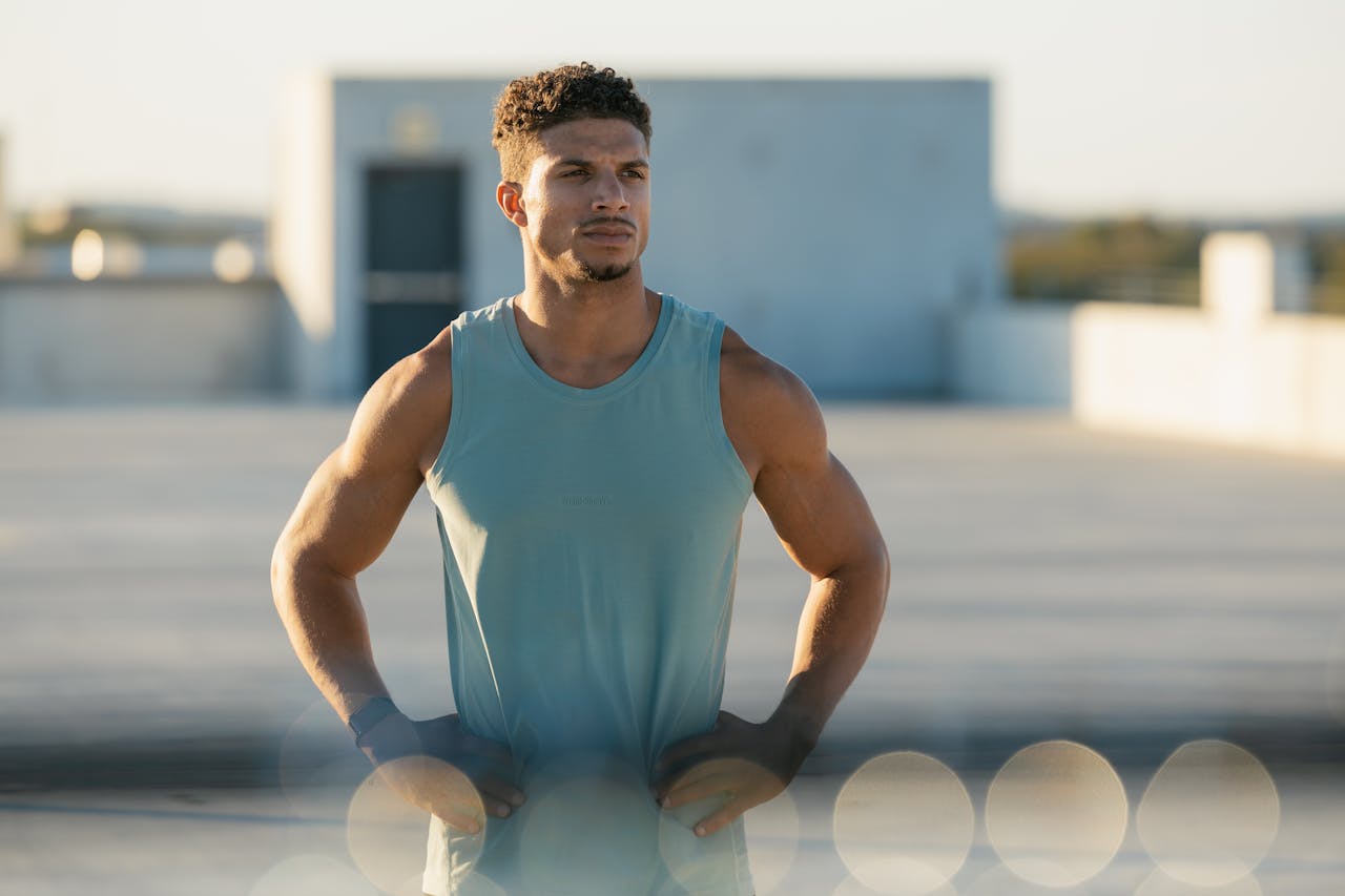 home-services-01 Fit man in casual workout attire on a city rooftop, Austin, Texas.